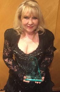vac-awards-2016-karen-with-the-trophy